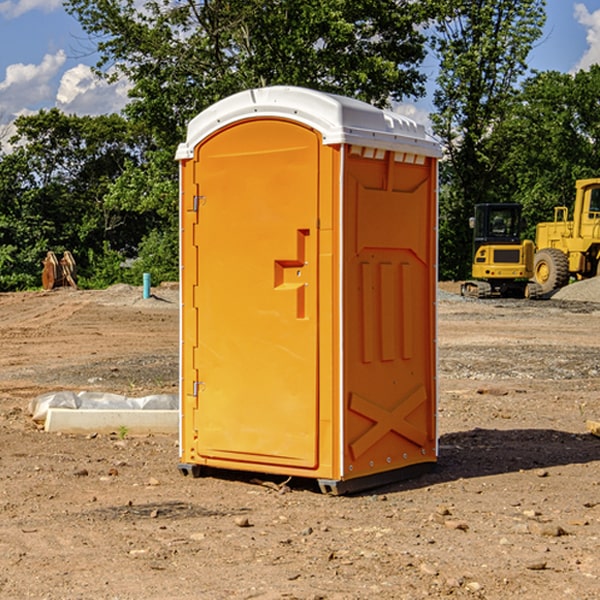 how often are the portable restrooms cleaned and serviced during a rental period in Manville